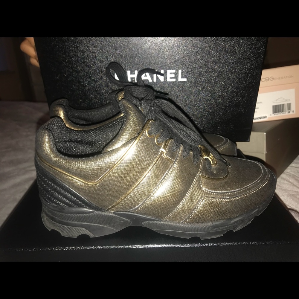 Chanel black and gold sneaker